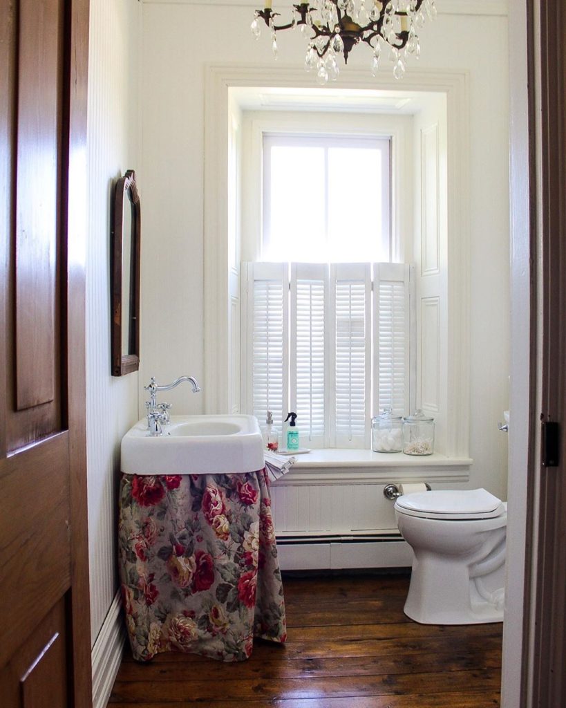 Guest bathroom with flower drape vanity