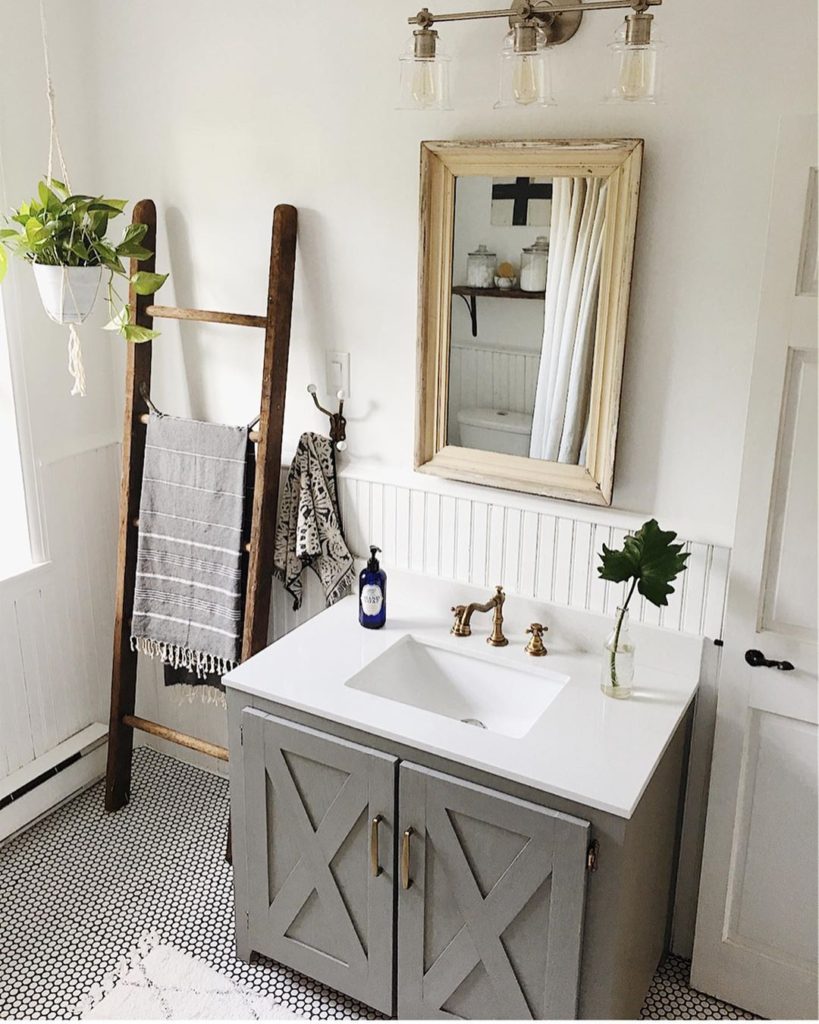 rustic farmhouse bathroom with gray vanity