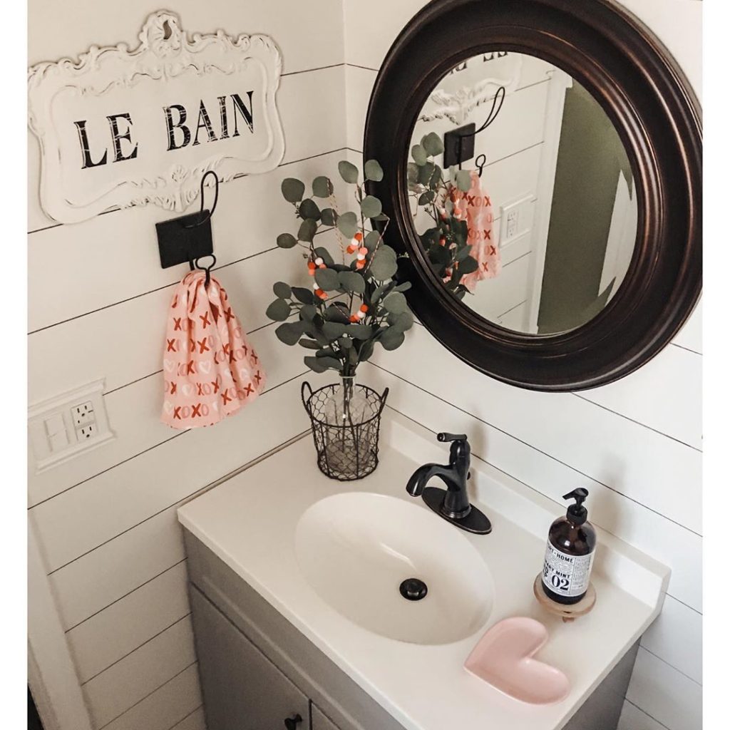 shiplap wall guest bathroom gray vanity bronze mirror