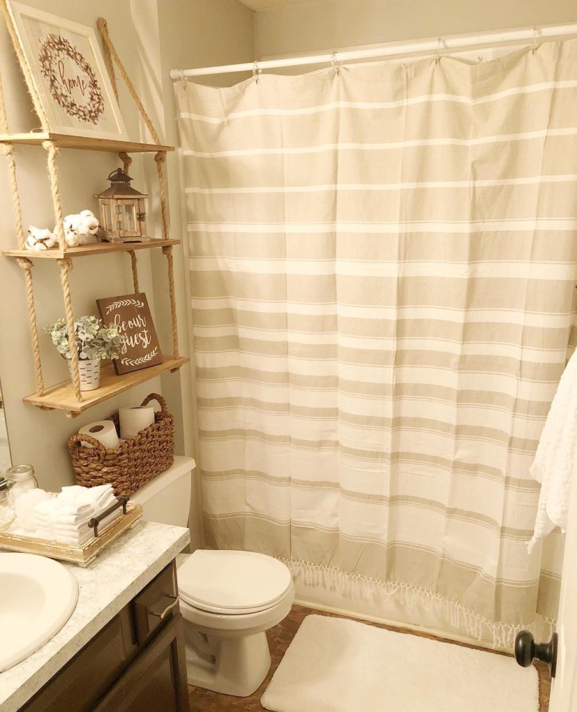 tan and cream colored guest bathroom in neutral