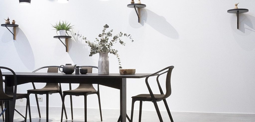 Modern dining table with minimalist wall decor