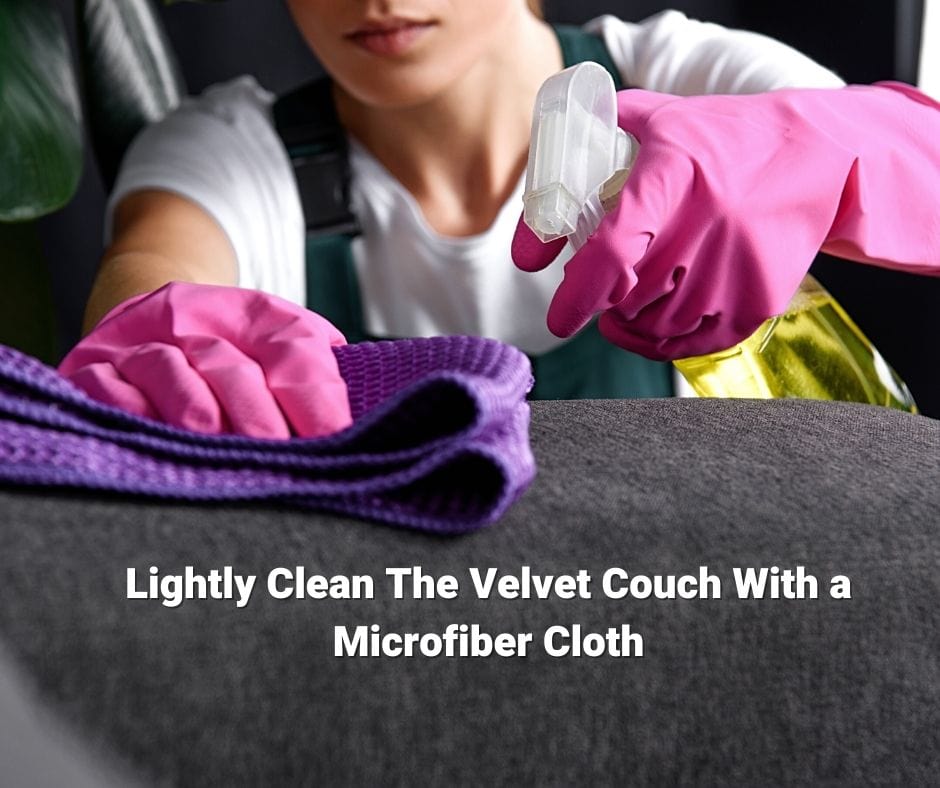 Cleaning velvet couch with mico fiber cloth to deodorize it