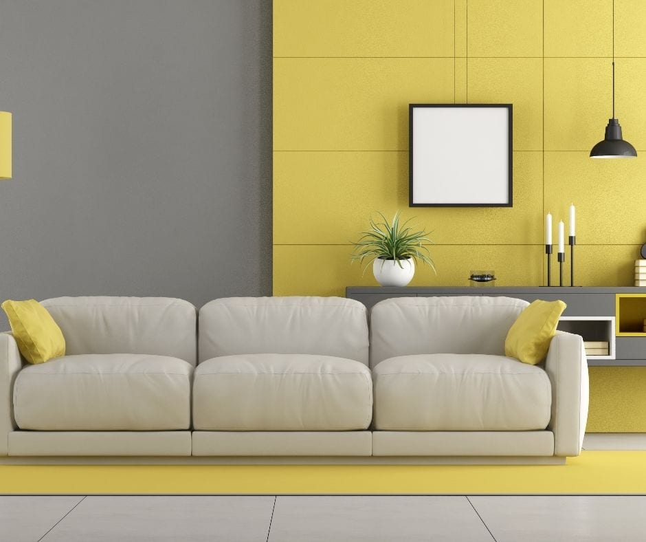 yellow rug under gray couch