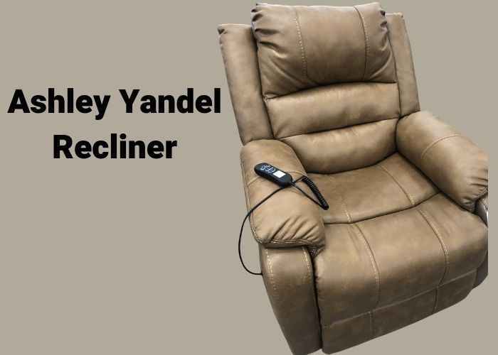 Ashley Yandel recliner being tested for comfort