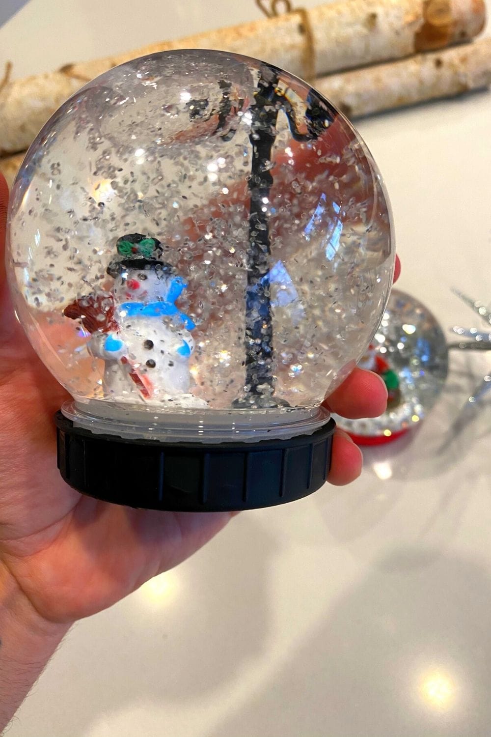 DIY Snow globe with snowman inside and black base