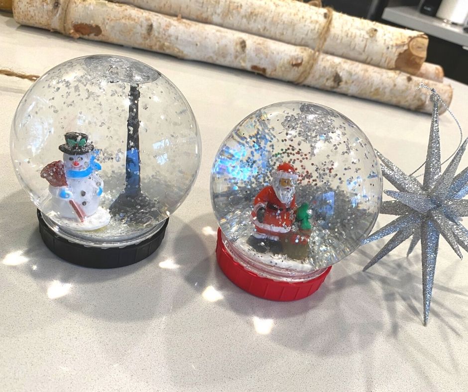 DIY Snow globes with santa and snowman inside 