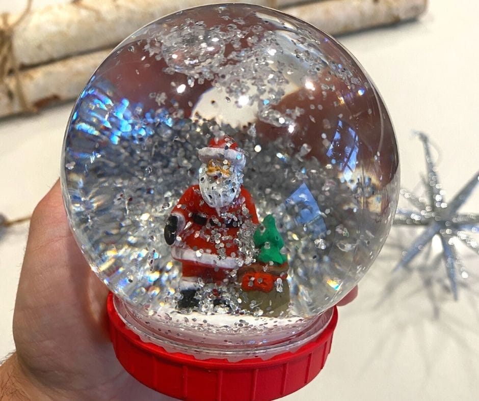 close up of santa snow globe