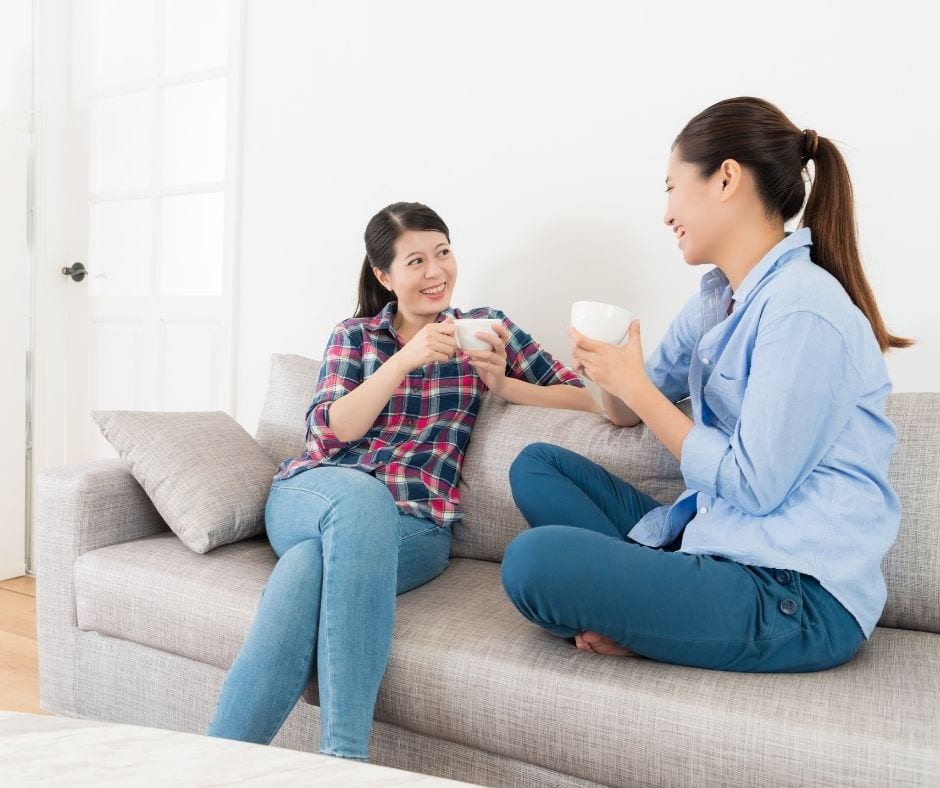 people talking in living room