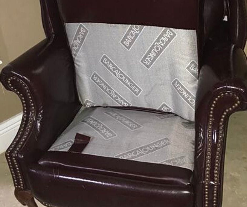 Recliner with seat pulled up to show off springs