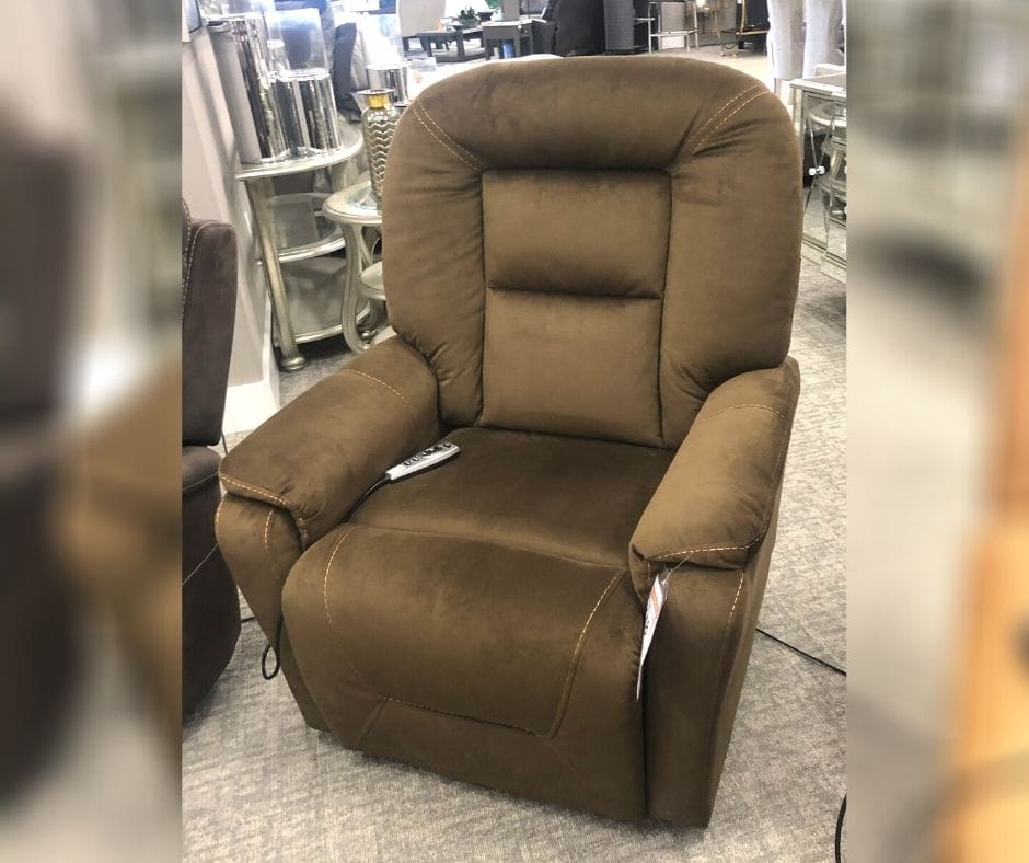 image of recliner being inspected and fixed