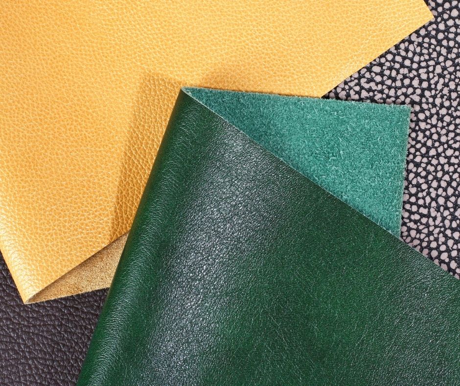 various pieces of microfiber leather laid out on a table