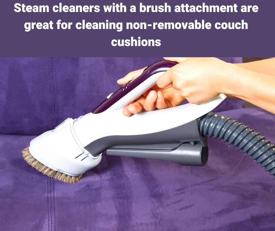 steam cleaner being used to clean non-removable couch cushion