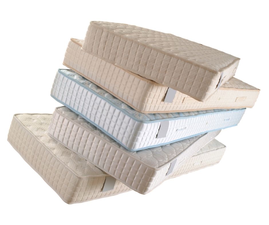 stack of different sized mattresses to be used for a futon