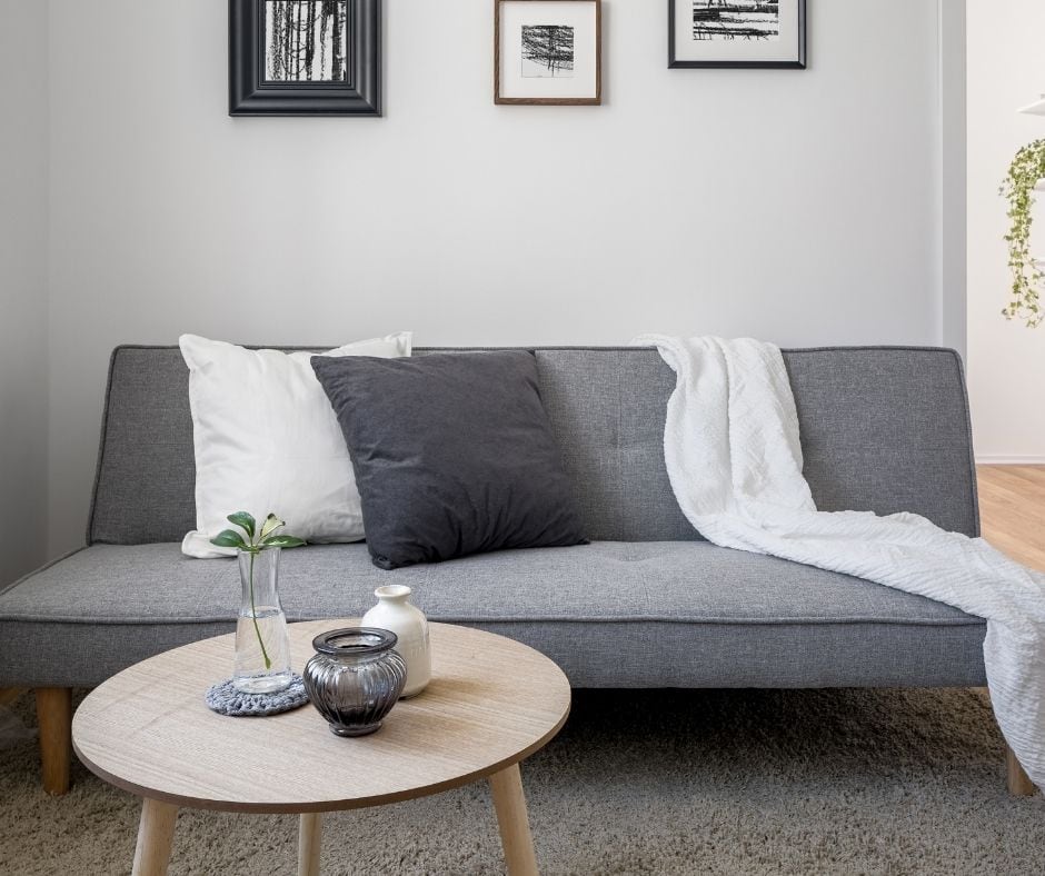 futon in display on living room