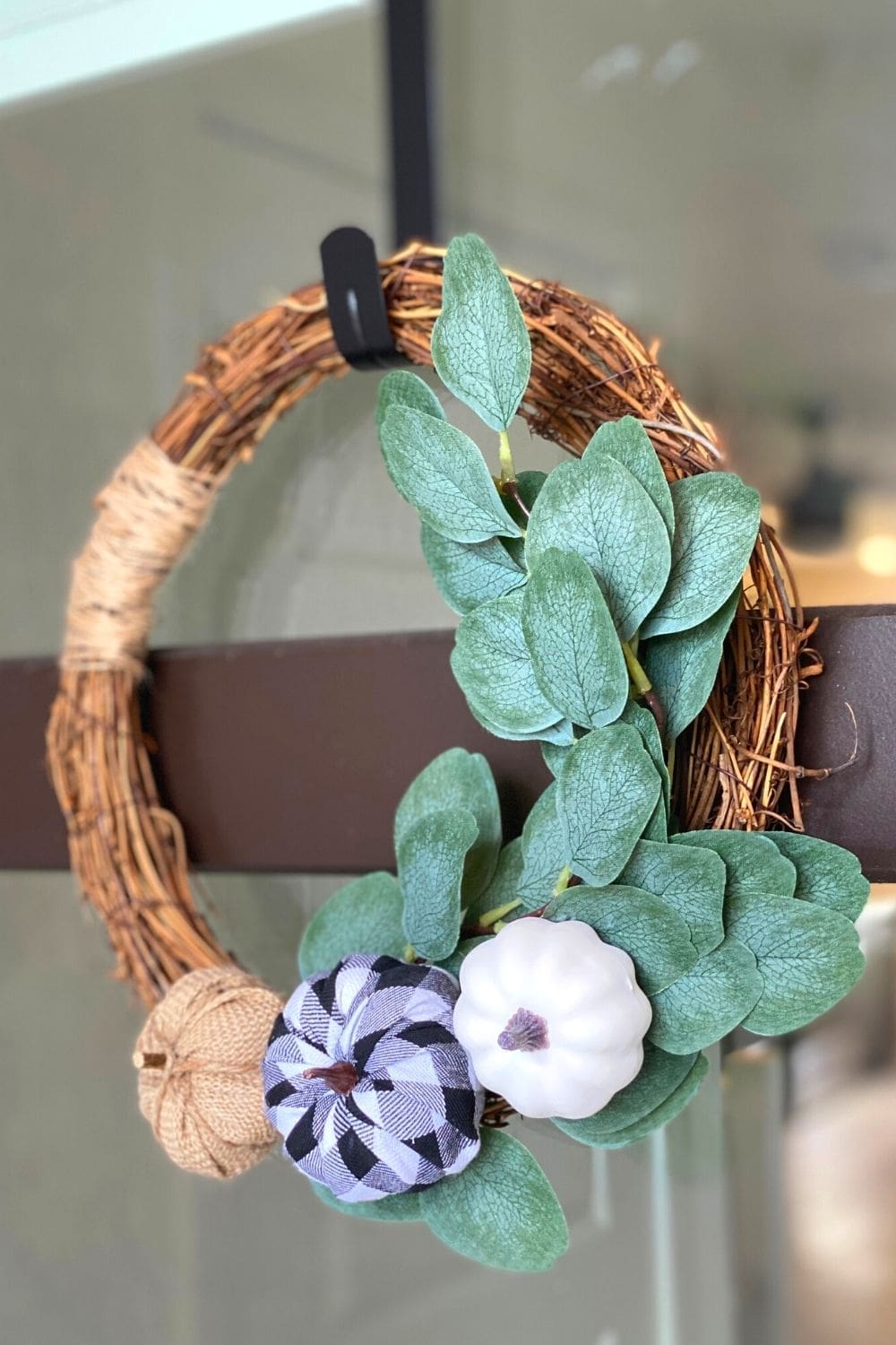 diy farmhouse wreath hanging on front door