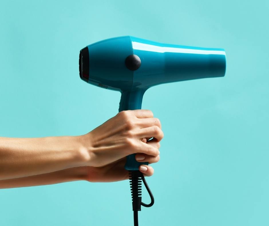 Use a hair dryer for removing hardened glue