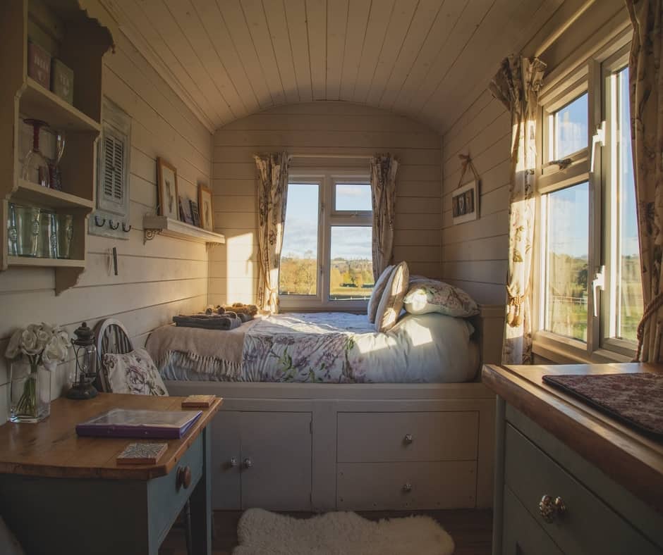 A small bedroom also used for storage