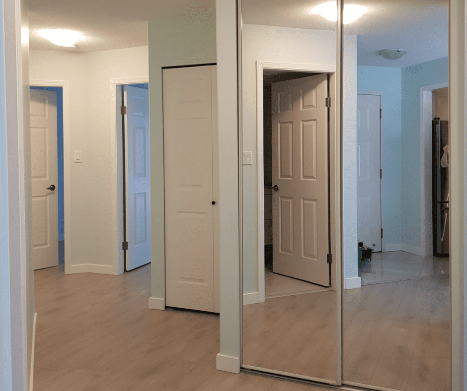 Sliding door covered by mirrors