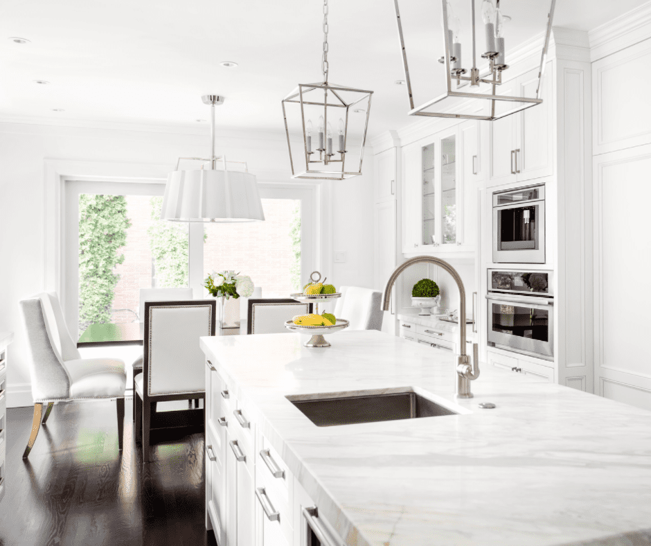 White modern kitchen beside the dining table