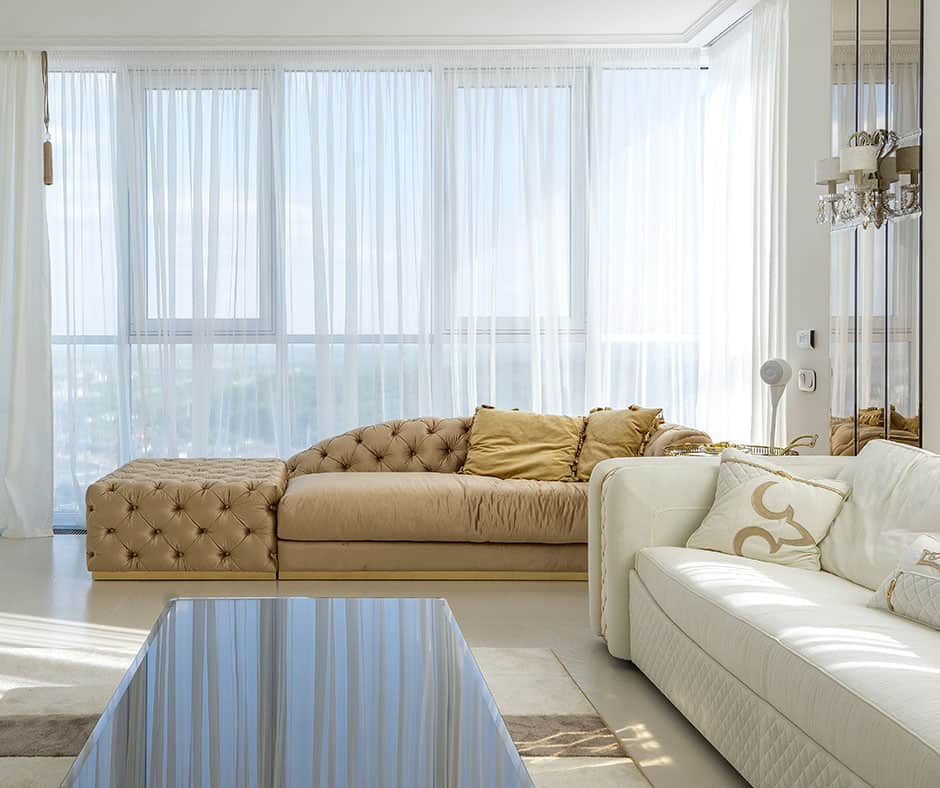 Beige sofa in elegant living room