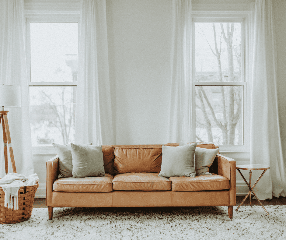 White rug on dark wooden floor