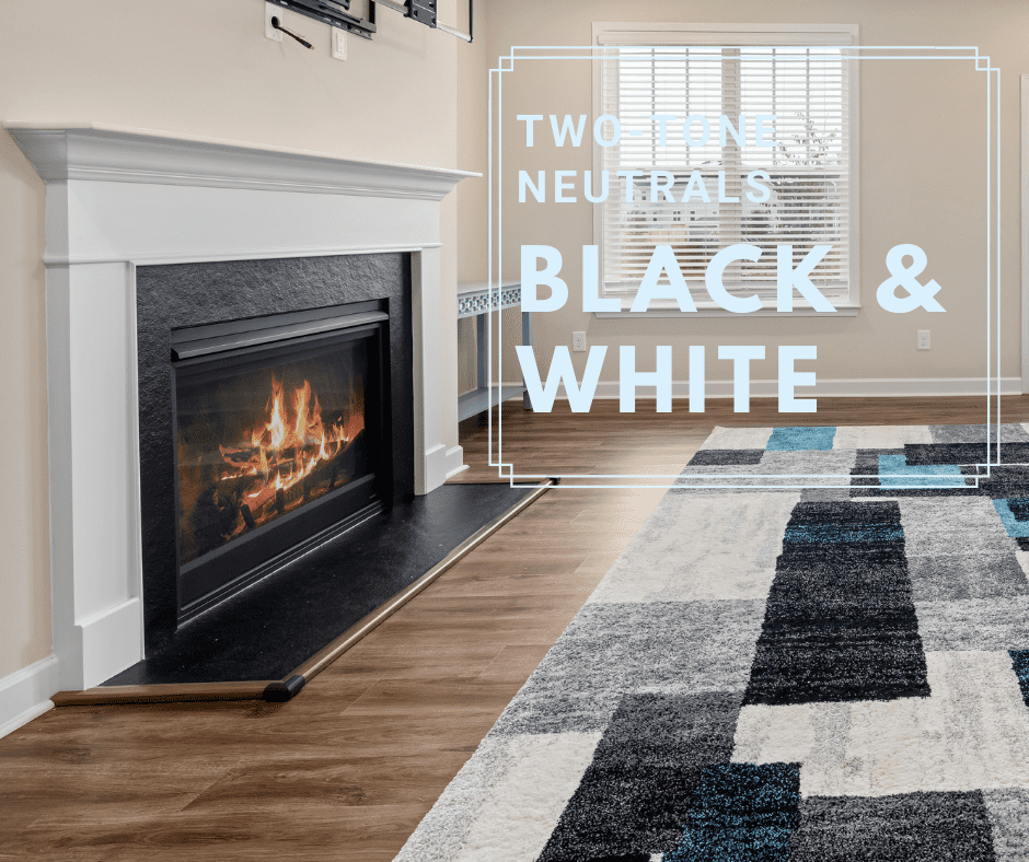 Black and white rug on dark wooden floor