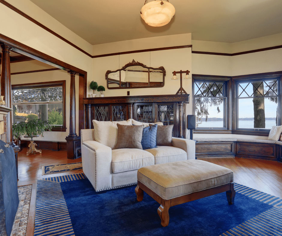 Blue rug with beige couch