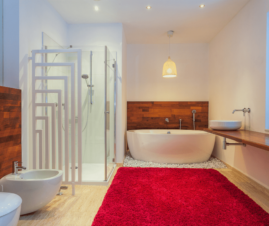 Bathroom with a large red rug