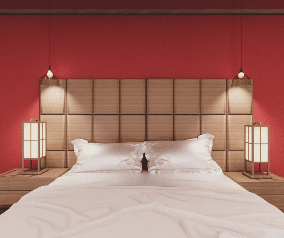 Bed with wall-mounted headboard