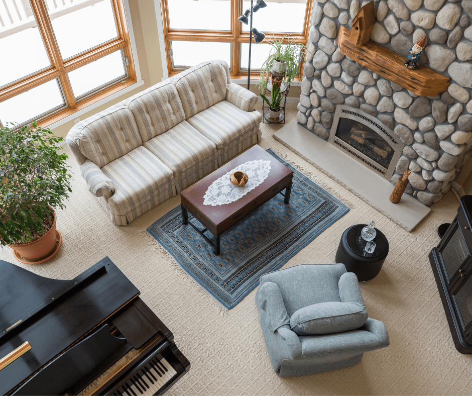 Light blue rug with beige couch