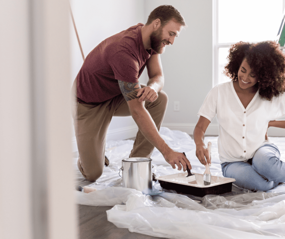 Couple painting their room