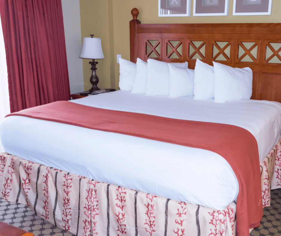 King size bed with a brightly-colored bedding