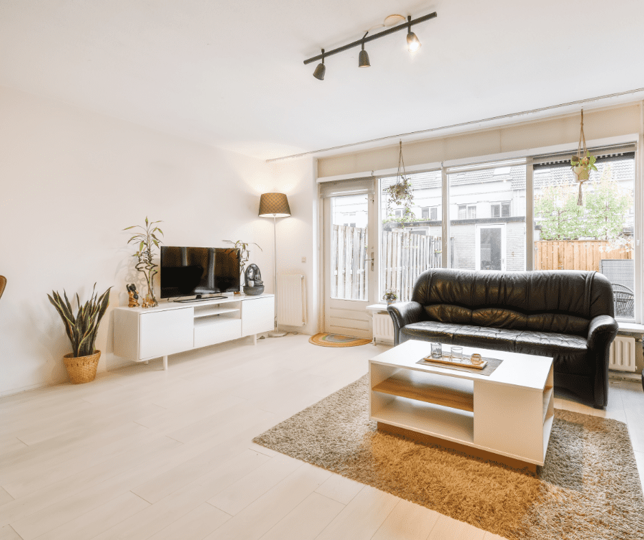 Spacious living room with some furniture in it