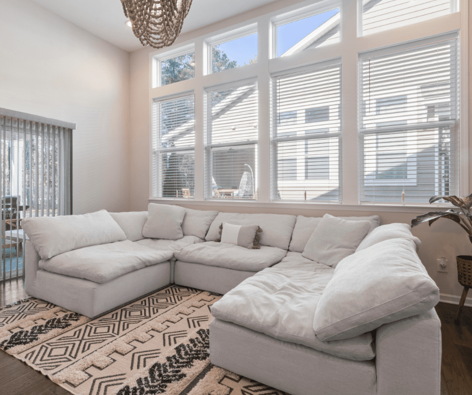 A gray sectional sofa in a small living room