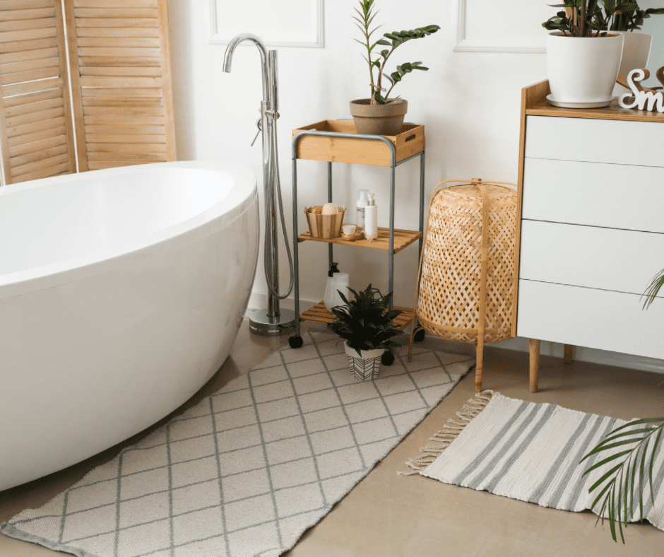 Rectangular rugs beside the bath tub