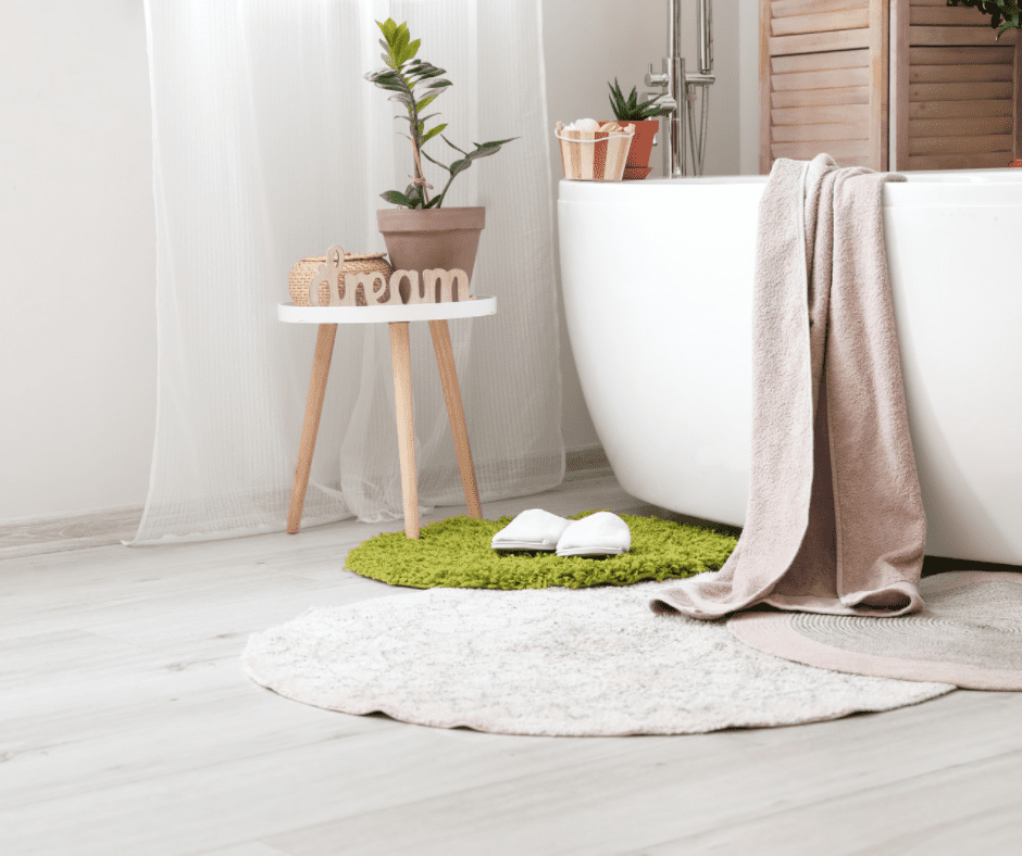 Round rugs beside the bath tub