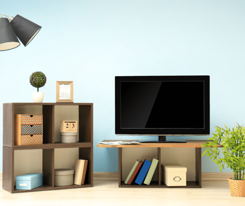 TV on a coffee table used as a shelf