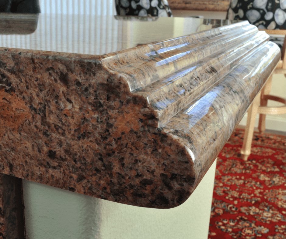 A close-up of a tan brown granite countertop