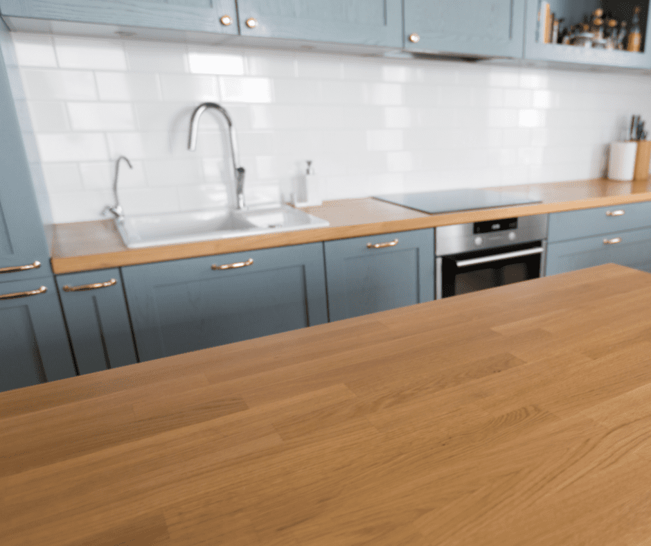 A cute kitchen with laminate countertops