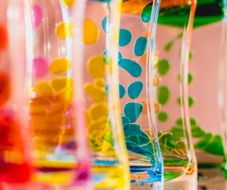 Colorful lava lamps lined up