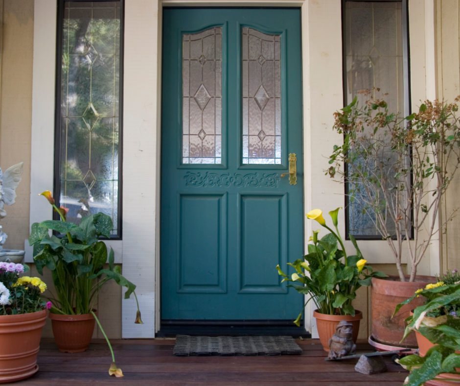 A front door that's painted close to the shade of silken peacock.