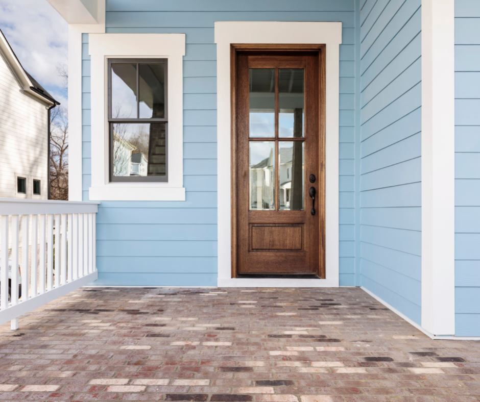 A front door that's painted close to the shade of caraibe.