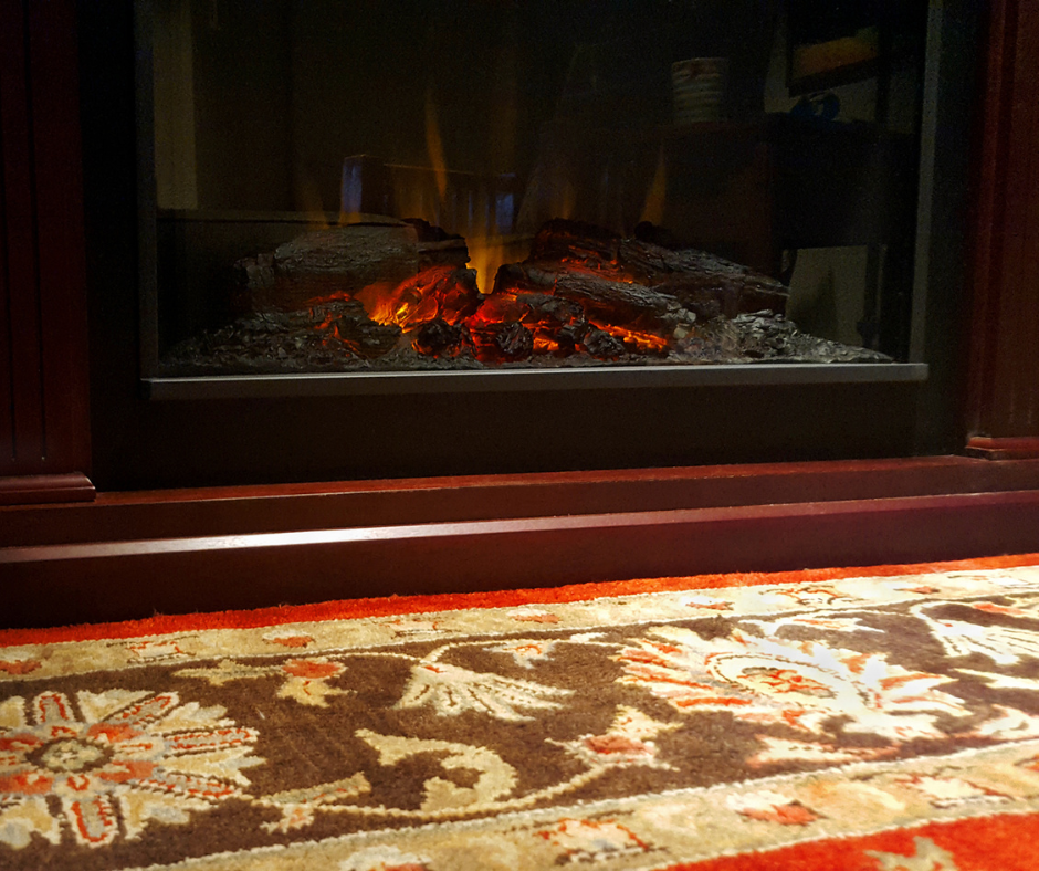 Hearth rug near a fireplace