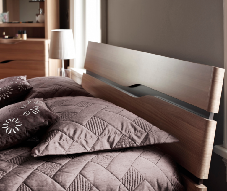 What Goes Behind a Headboard to Stop Wall Damage?