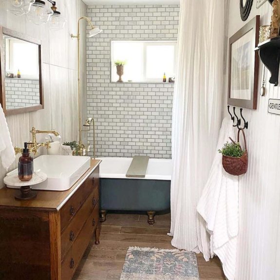 Country bathroom with rug and subwaytile