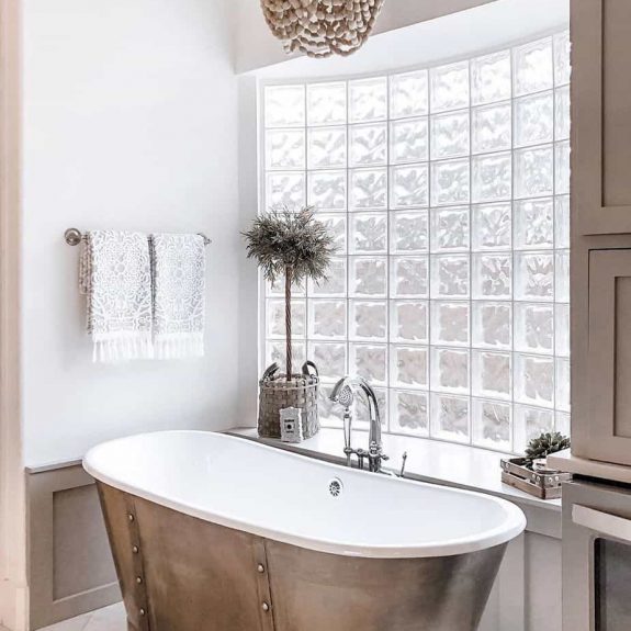 country bathroom with metal tub