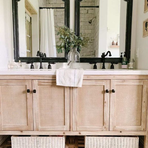 double vanity farmhouse bathroom with under shelf storage